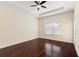 Bedroom with hardwood floors and window with blinds at 206 Clovis Pass, Winter Haven, FL 33880