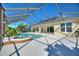 Screened pool and spa with solar panels at 206 Clovis Pass, Winter Haven, FL 33880