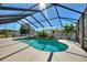 Inviting screened pool and spa at 206 Clovis Pass, Winter Haven, FL 33880