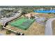 Tennis and basketball courts in a community setting at 206 Clovis Pass, Winter Haven, FL 33880