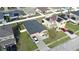 Aerial view of a single-Gathering home with a spacious backyard and a two-car driveway at 1109 Brenton Manor Dr, Winter Haven, FL 33881