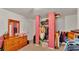 Walk-in closet with organized storage solutions and ample space for clothing at 1705 Davis Ave, Bartow, FL 33830