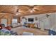 Cozy living room featuring a TV, comfortable furniture, wood ceilings, and a light and airy feel at 1705 Davis Ave, Bartow, FL 33830