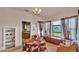 Inviting living room featuring a stained glass window and a cozy seating area at 1705 Davis Ave, Bartow, FL 33830