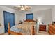 Comfortable bedroom featuring a ceiling fan and cozy decor at 1705 Davis Ave, Bartow, FL 33830