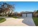 Charming single Gathering home with a well-manicured lawn, mature trees and a two car garage at 1865 15Th Nw Ct, Winter Haven, FL 33881