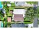 Aerial view of the property highlighting backyard, gazebo, shed, and surrounding area at 1819 Meadowbrook Ave, Lakeland, FL 33803
