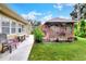 Yard with gazebo and lush grass at 1819 Meadowbrook Ave, Lakeland, FL 33803