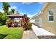 Backyard with gazebo and lush landscaping at 1819 Meadowbrook Ave, Lakeland, FL 33803