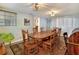 Classic dining room with wooden table and chairs, decorative rug and built-in storage at 1819 Meadowbrook Ave, Lakeland, FL 33803