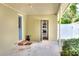 Covered patio with storage closet offers convenient outdoor living and storage solutions at 1819 Meadowbrook Ave, Lakeland, FL 33803