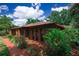 A landscaped brick home with a brick walkway at 4428 Sugartree E Dr, Lakeland, FL 33813
