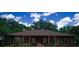 Charming brick home with a new roof and manicured landscaping at 4428 Sugartree E Dr, Lakeland, FL 33813