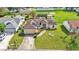 Aerial view of a single story house with a large yard at 7454 Briarbay Loop, Lakeland, FL 33810