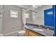 Bathroom with granite countertop vanity and bathtub at 7454 Briarbay Loop, Lakeland, FL 33810