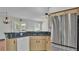 Kitchen with stainless steel appliances and granite countertops at 7454 Briarbay Loop, Lakeland, FL 33810