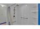 Updated shower with grab bars and a modern shower head at 7454 Briarbay Loop, Lakeland, FL 33810