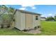 Yard with a well-maintained storage shed at 7454 Briarbay Loop, Lakeland, FL 33810