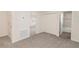 Spacious bedroom with plush carpeting, a closet, and two doorways at 2214 Oldham Ct, Haines City, FL 33844