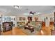 Bright living room with hardwood floors and comfortable seating at 1175 E George St, Bartow, FL 33830