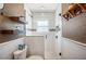 Updated bathroom with a tiled shower and modern fixtures at 17 Loma Verde # 17, Lakeland, FL 33813