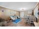 Versatile bonus room with rocking chairs and dining table at 17 Loma Verde # 17, Lakeland, FL 33813