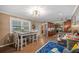 Spacious dining area with kitchen and living room views at 17 Loma Verde # 17, Lakeland, FL 33813