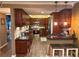 Updated kitchen featuring wood cabinets and breakfast bar at 17 Loma Verde # 17, Lakeland, FL 33813