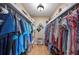 Spacious walk-in closet with ample shelving and hanging space at 17 Loma Verde # 17, Lakeland, FL 33813
