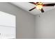 Neutral bedroom featuring carpet, ceiling fan, and window at 5074 Shore Side Dr, Lakeland, FL 33812