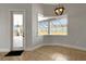 Dining area featuring a bay window looking out to outdoor area and a chandelier at 5074 Shore Side Dr, Lakeland, FL 33812