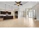A light and bright, spacious living room and island kitchen with high ceilings and modern finishes at 5074 Shore Side Dr, Lakeland, FL 33812
