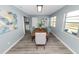 Bright dining room with an inviting table and ample natural light at 1220 Woodland Ave, Lakeland, FL 33801