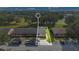 Aerial view of villa and surrounding landscape at 2256 Firestone Pl, Winter Haven, FL 33884