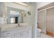 Clean bathroom with vanity, toilet and shower at 2256 Firestone Pl, Winter Haven, FL 33884