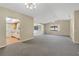 Open dining area with view into the kitchen at 2256 Firestone Pl, Winter Haven, FL 33884