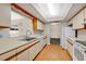 Clean and functional kitchen with light cabinetry at 2256 Firestone Pl, Winter Haven, FL 33884