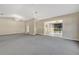 Spacious living room with carpet and access to a sunroom at 2256 Firestone Pl, Winter Haven, FL 33884