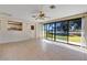 Sunroom with tile floor and sliding glass doors at 2256 Firestone Pl, Winter Haven, FL 33884
