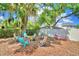 Relaxing backyard with fire pit and seating at 415 W Beacon Rd, Lakeland, FL 33803