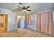 Bright bedroom with access to bathroom and neutral decor at 415 W Beacon Rd, Lakeland, FL 33803