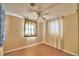 Spacious bedroom featuring wood flooring and a ceiling fan at 415 W Beacon Rd, Lakeland, FL 33803