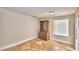 Bright dining area with tile floors and a wooden hutch at 415 W Beacon Rd, Lakeland, FL 33803
