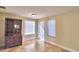 Bright dining room with tile floors and built-in hutch at 415 W Beacon Rd, Lakeland, FL 33803