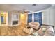 Living area with fireplace and tiled floors at 415 W Beacon Rd, Lakeland, FL 33803