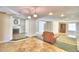 Open living area with a view of the kitchen and fireplace at 415 W Beacon Rd, Lakeland, FL 33803