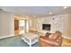 Living area with a stone fireplace and comfortable seating at 415 W Beacon Rd, Lakeland, FL 33803