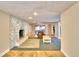 Spacious living room featuring a stone fireplace and access to a patio at 415 W Beacon Rd, Lakeland, FL 33803