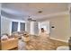 Spacious living room with tile floors and fireplace at 415 W Beacon Rd, Lakeland, FL 33803