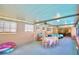 Covered patio with seating and dining area at 415 W Beacon Rd, Lakeland, FL 33803